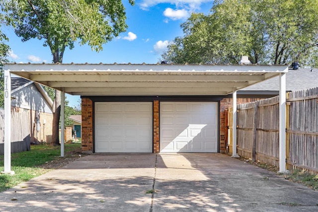 garage featuring fence