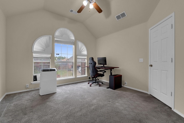 office area featuring lofted ceiling, carpet flooring, visible vents, and baseboards