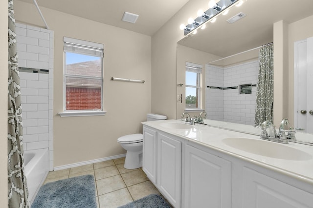 bathroom with visible vents, a sink, and tile patterned floors