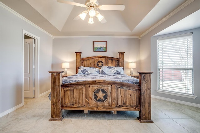 bedroom with a raised ceiling, ceiling fan, baseboards, and light tile patterned floors