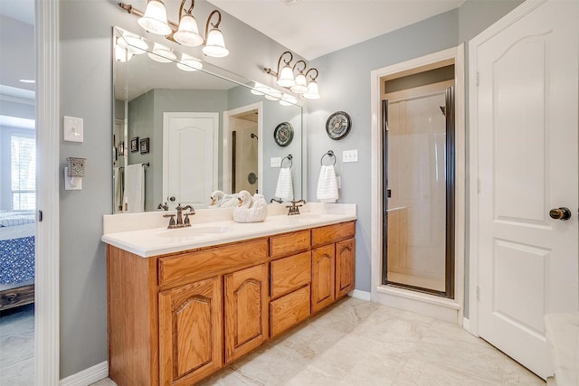 ensuite bathroom with a stall shower, a sink, ensuite bath, and double vanity