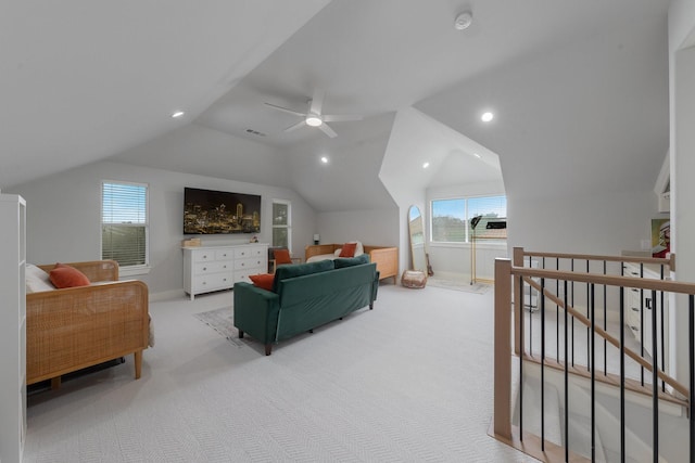 living room with recessed lighting, baseboards, vaulted ceiling, and light colored carpet