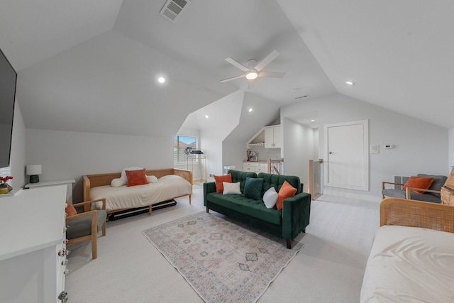 bedroom featuring a ceiling fan, light colored carpet, visible vents, and lofted ceiling