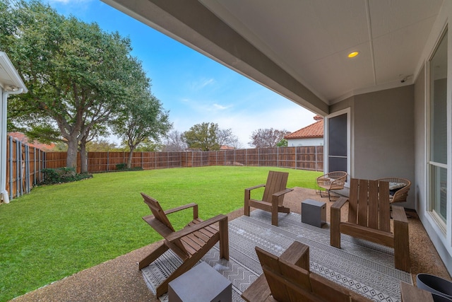 view of patio with a fenced backyard