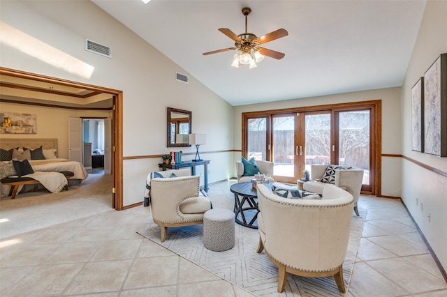 dining space featuring high vaulted ceiling, french doors, visible vents, and light tile patterned floors