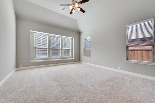 empty room with baseboards, visible vents, and light colored carpet