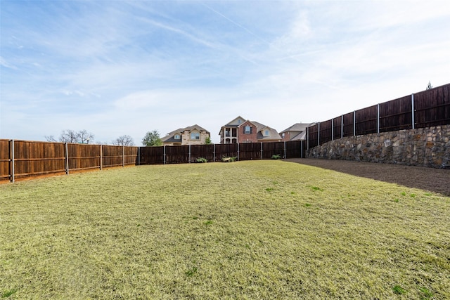 view of yard featuring a fenced backyard