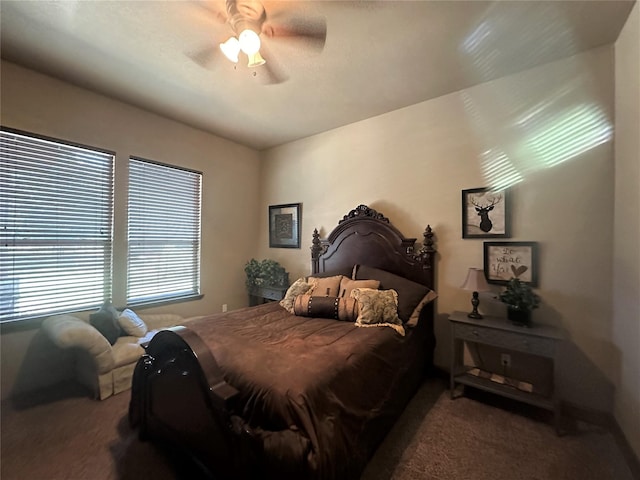 carpeted bedroom with a ceiling fan