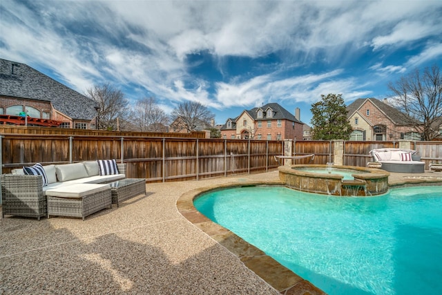 view of swimming pool with a patio, a residential view, a fenced backyard, and an outdoor living space