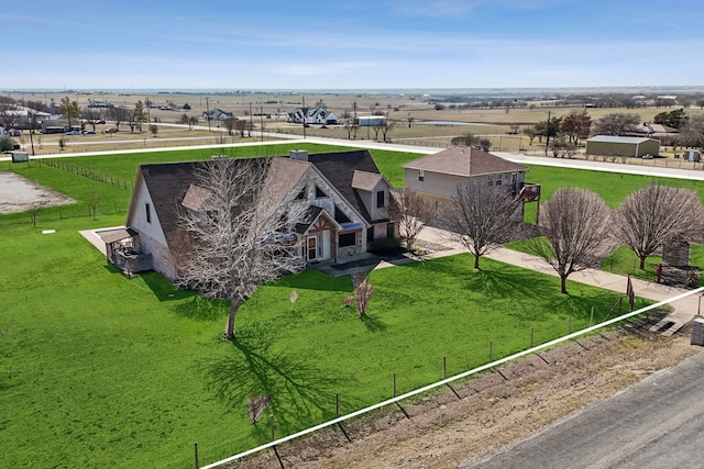 birds eye view of property featuring a rural view