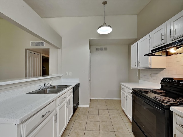 kitchen with visible vents, white cabinets, under cabinet range hood, light countertops, and black appliances