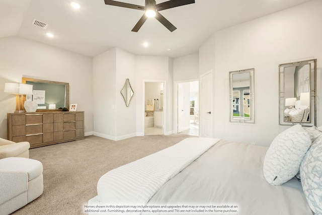 bedroom featuring lofted ceiling, recessed lighting, light carpet, visible vents, and ensuite bath