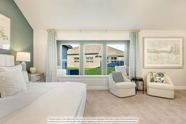 bedroom with lofted ceiling, carpet, multiple windows, and baseboards