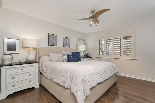 bedroom featuring a ceiling fan, dark wood finished floors, and baseboards