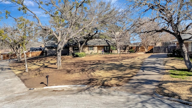 view of front of house with fence