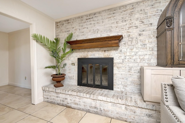 interior details featuring ornamental molding, a fireplace, and baseboards