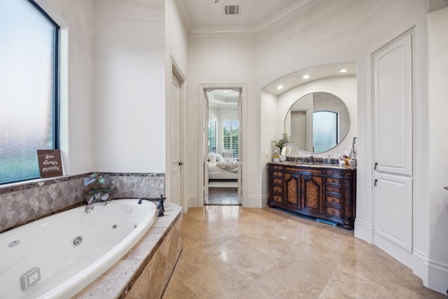 bathroom with crown molding, visible vents, vanity, ensuite bath, and a jetted tub