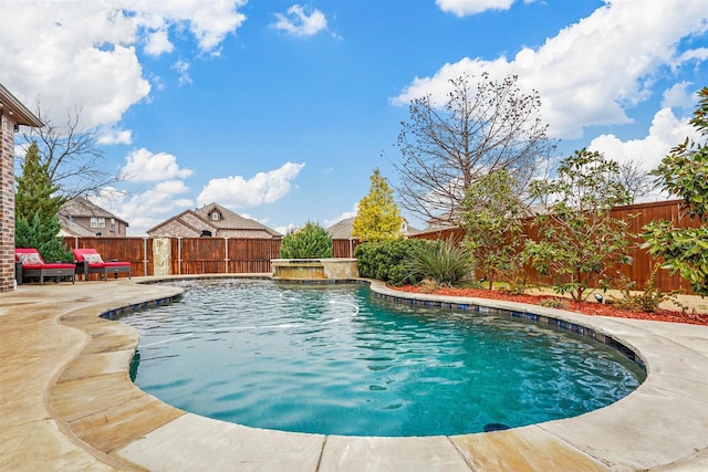 view of swimming pool with a fenced in pool, a patio area, a fenced backyard, and an in ground hot tub