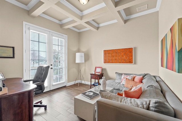 office area featuring light wood finished floors, visible vents, coffered ceiling, beamed ceiling, and french doors