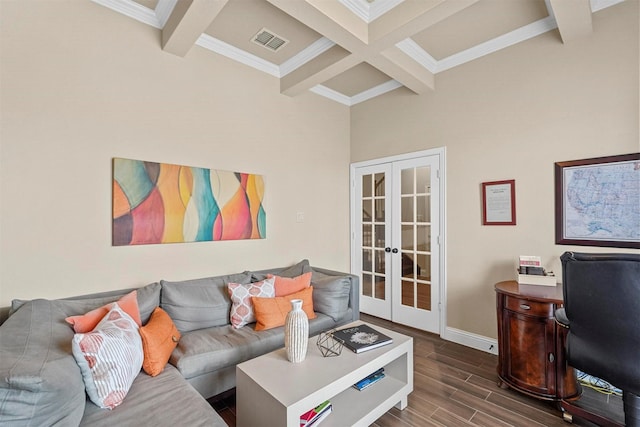 living area featuring wood tiled floor, beamed ceiling, and french doors