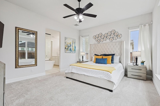 2840 Killdeer Trl, Prosper, TX 75078 - carpeted bedroom featuring multiple windows, baseboards, ensuite bath, and a ceiling fan
