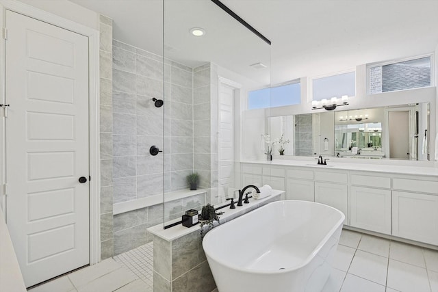 2840 Killdeer Trl, Prosper, TX 75078 - bathroom featuring a walk in shower, a soaking tub, tile patterned flooring, vanity, and recessed lighting