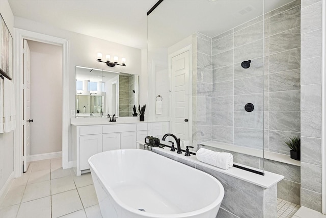 2840 Killdeer Trl, Prosper, TX 75078 - bathroom featuring a soaking tub, a walk in shower, tile patterned flooring, and vanity