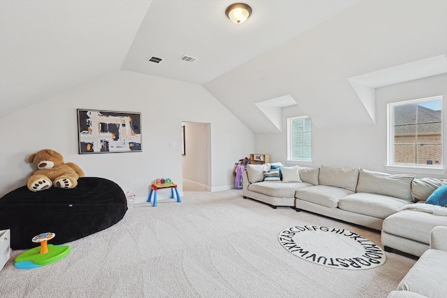 2840 Killdeer Trl, Prosper, TX 75078 - carpeted living room featuring vaulted ceiling and baseboards