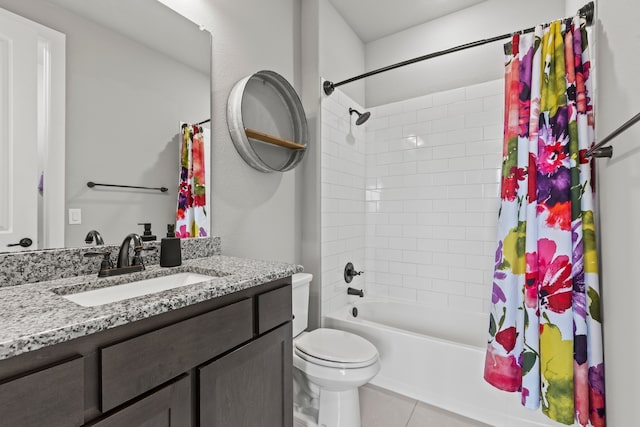 bathroom with shower / bath combo, vanity, toilet, and tile patterned floors