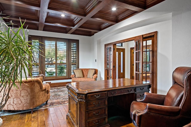 home office with coffered ceiling, dark wood-style flooring, beamed ceiling, crown molding, and recessed lighting