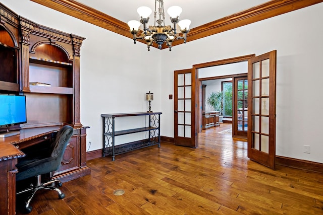 home office with a notable chandelier, ornamental molding, dark wood-type flooring, and french doors