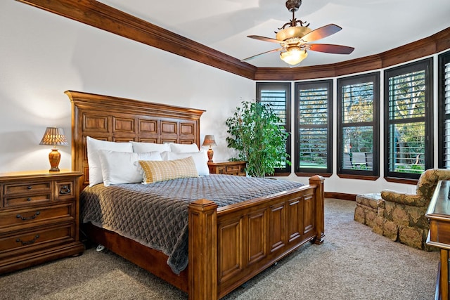 bedroom with ornamental molding, carpet, baseboards, and a ceiling fan