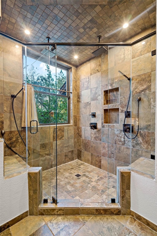 full bath with a stall shower and a textured wall