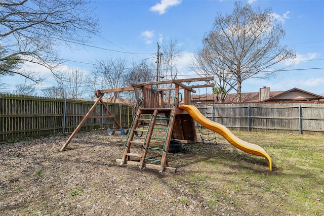 view of play area with a fenced backyard