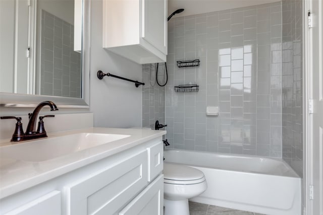 full bathroom featuring vanity, tile patterned floors, toilet, and tub / shower combination