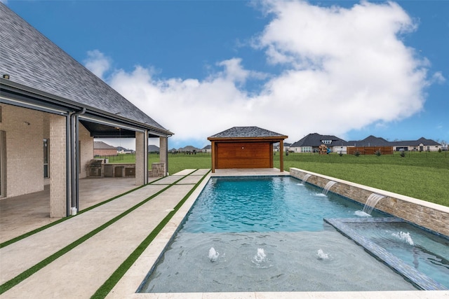 outdoor pool featuring a patio and a yard