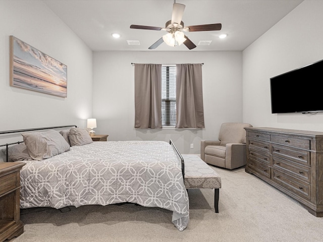 bedroom with a ceiling fan, recessed lighting, light carpet, and visible vents