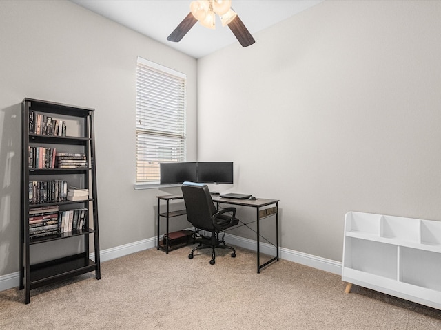 office area featuring carpet, ceiling fan, and baseboards