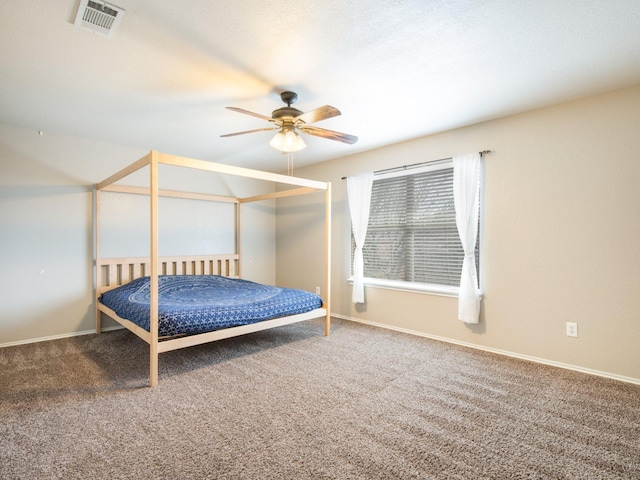 bedroom featuring visible vents, ceiling fan, baseboards, and carpet