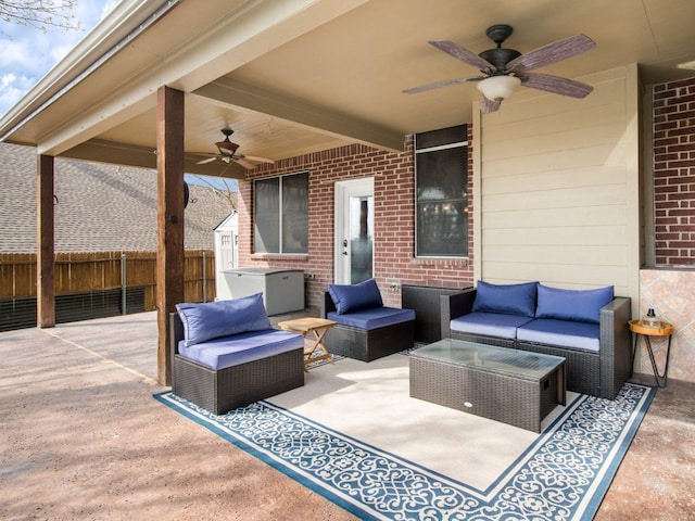 view of patio / terrace with an outdoor hangout area, ceiling fan, and fence