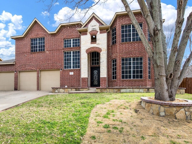 view of front of property with brick siding, a front lawn, concrete driveway, and a garage