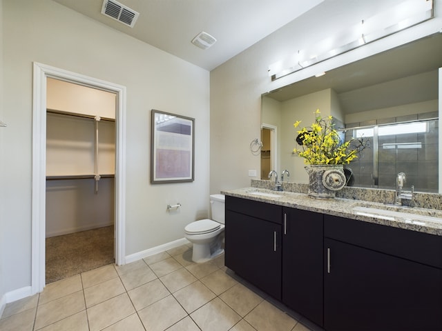 full bathroom featuring visible vents, a sink, and toilet