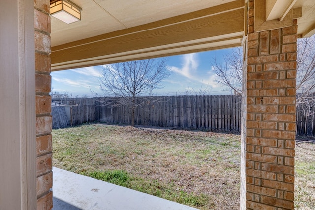 view of yard with a fenced backyard