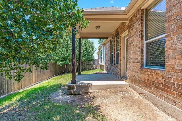 view of yard with a patio area and a fenced backyard