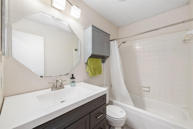 bathroom with a textured ceiling, shower / tub combo, vanity, and toilet