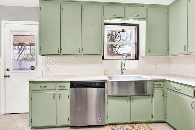 kitchen with green cabinets and stainless steel dishwasher