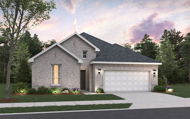 view of front of home featuring an attached garage, brick siding, concrete driveway, roof with shingles, and a front yard