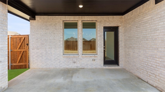 view of patio / terrace featuring a gate