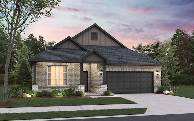 view of front facade featuring driveway, brick siding, and an attached garage