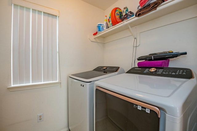 laundry area featuring laundry area and independent washer and dryer